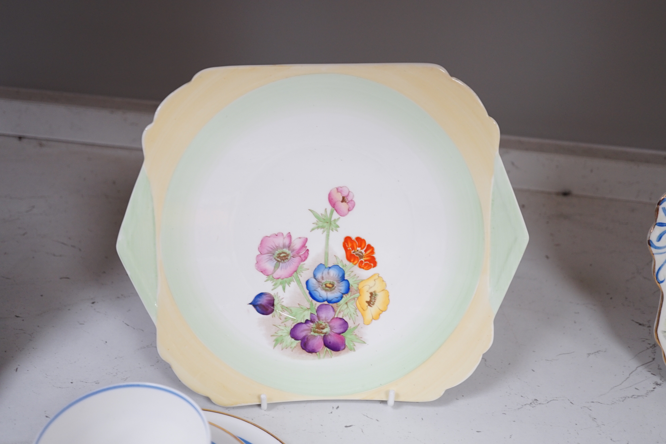 A Shelley Art Deco tea set numbered 795072 and sandwich plate together with a similar Foley plate, the largest 24.5cm wide